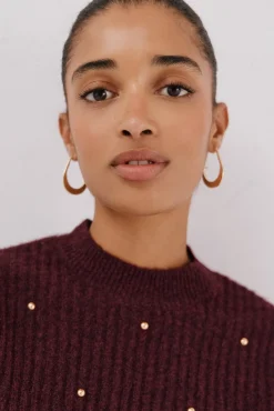 Jersey tachas doradas