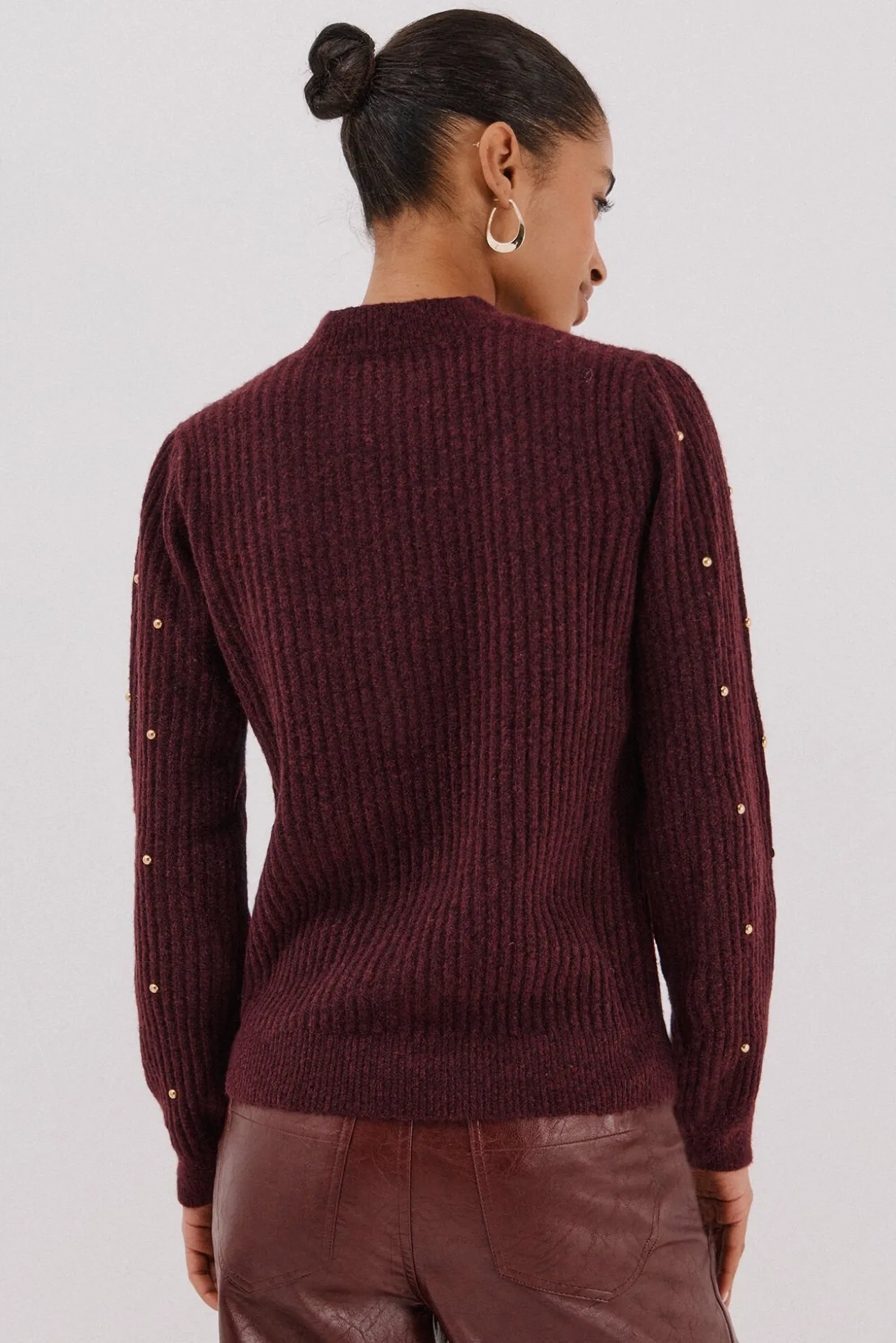 Jersey tachas doradas