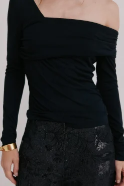 Magnolia. Top escote asimétrico