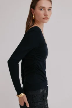 Magnolia. Top escote asimétrico