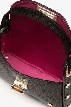 Mini bolso tachas piel