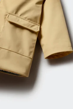 Parka amarillo pastel niño