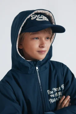 Parka azul marino frase niño