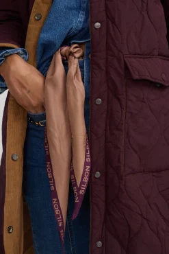 Parka larga acolchada detalles pana