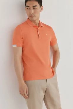 Polo puños contraste