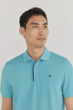 Polo puños contraste