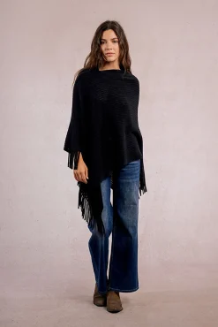 Poncho asimétrico con flecos