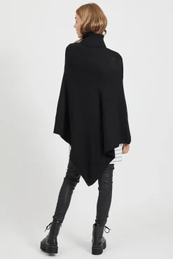 Poncho de punto con cuello vuelto