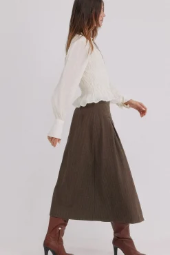 Reyes. Falda con pliegues