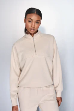 Sudadera cuello cremallera beige
