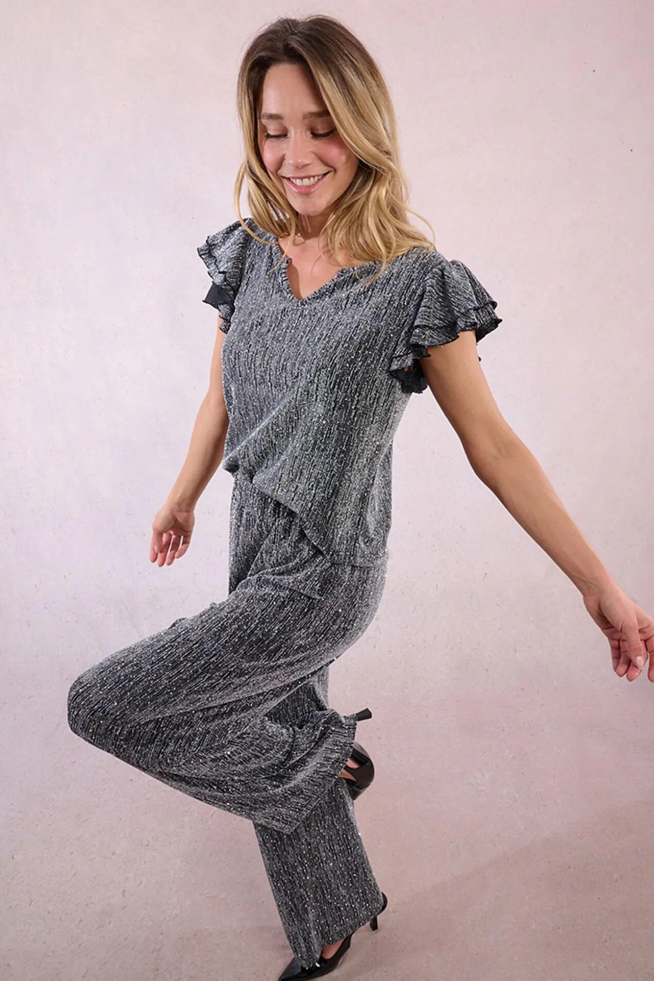 Top de manga corta detalle volantes