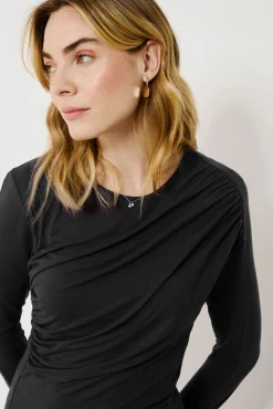 Top de manga larga con detalle drapeado