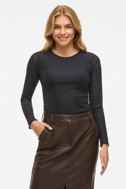 Top de manga larga con textura