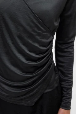 Top de manga larga tejido metalizado