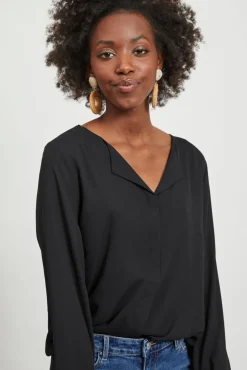 Top de mujer de manga larga con escote en pico