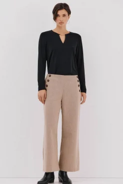 Top pieza dorada escote