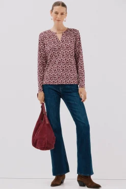 Top pieza dorada escote