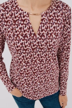 Top pieza dorada escote