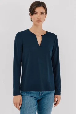 Top pieza dorada escote