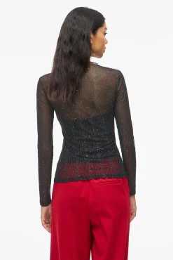 Top transparente con purpurina