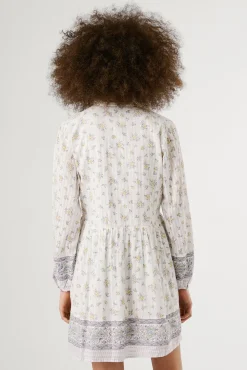 Vestido corto de manga larga con estampado floral.