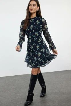 Vestido mini volantes