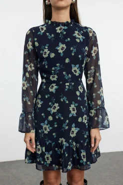 Vestido mini volantes